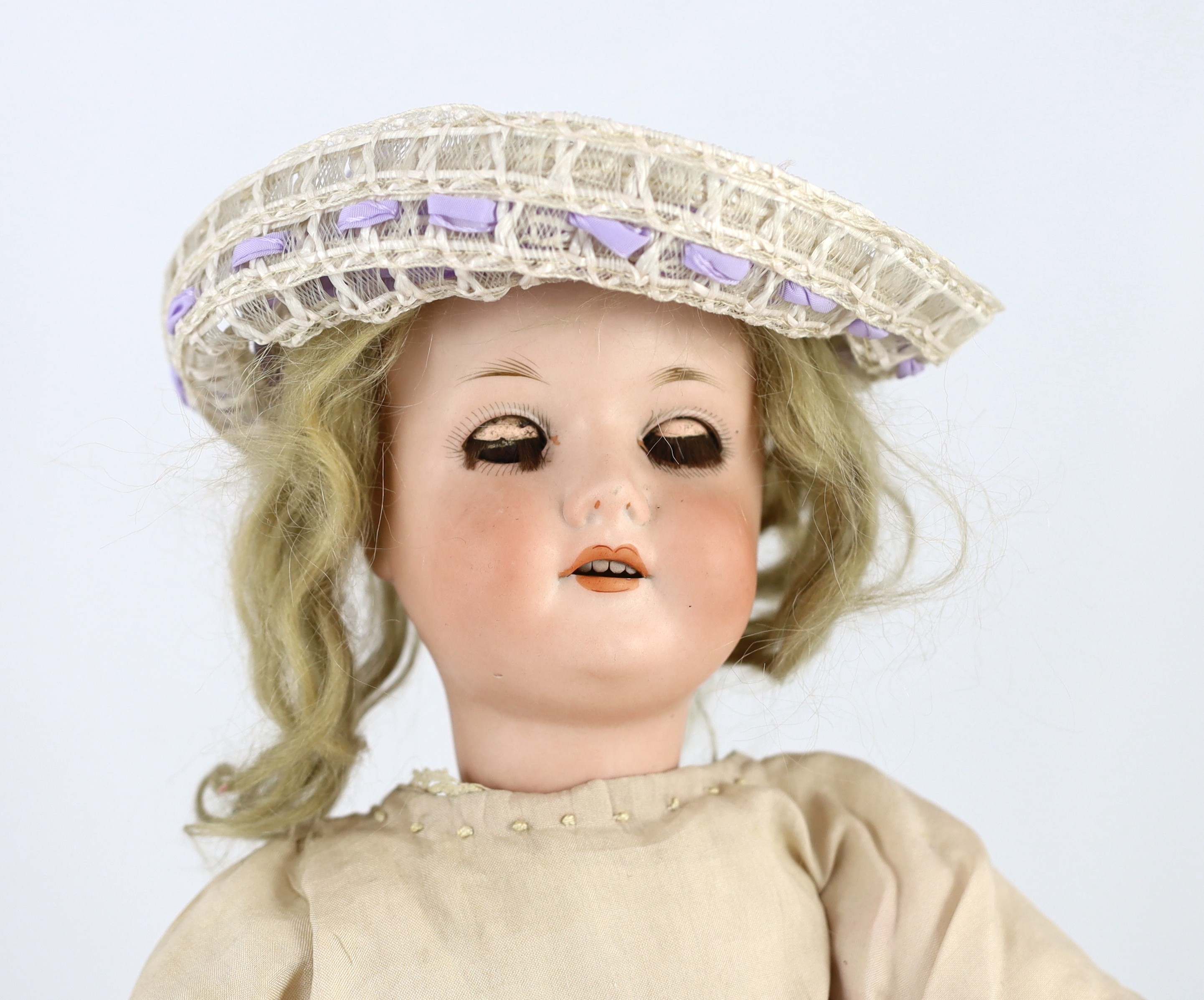 A C.M. Bergmann bisque doll, German, circa 1916, 17in.